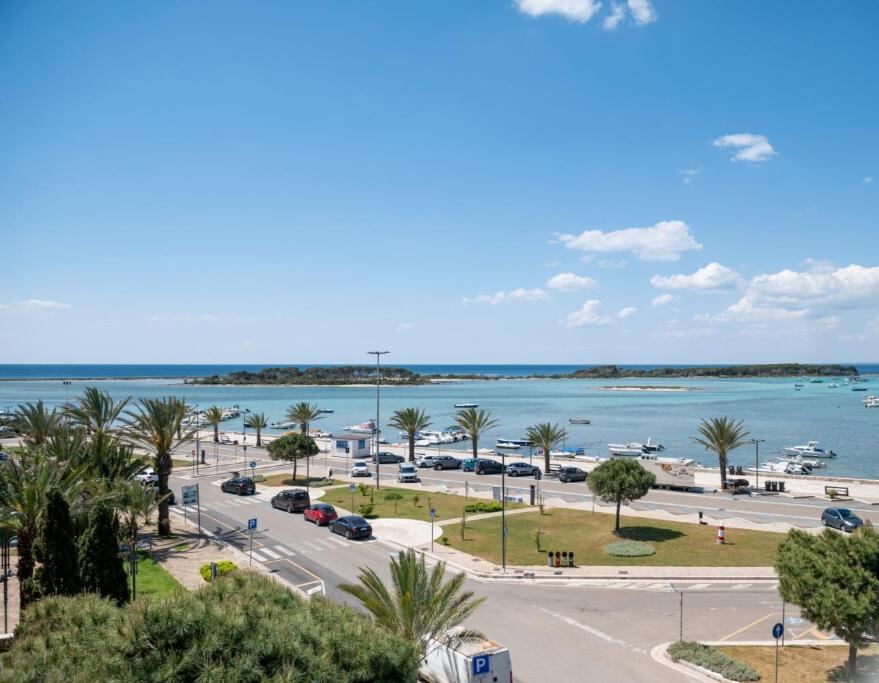 View over the harbour and the sea from Hotiday Porto Cesareo Spiaggia